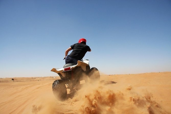 Quad dans les dunes